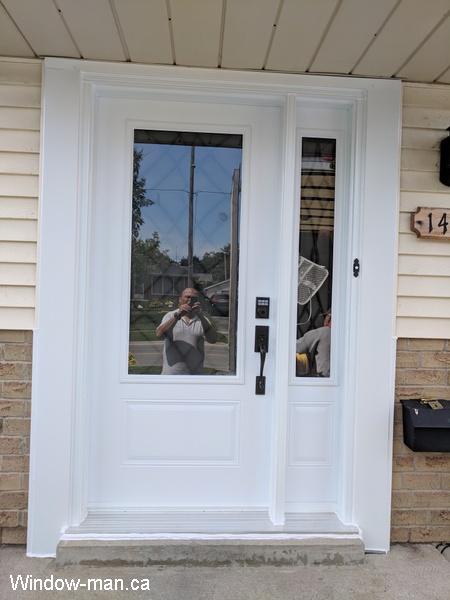 Single entry insulated steel exterior front door with one sidelite. White. Oak Ridge modern iron door glass